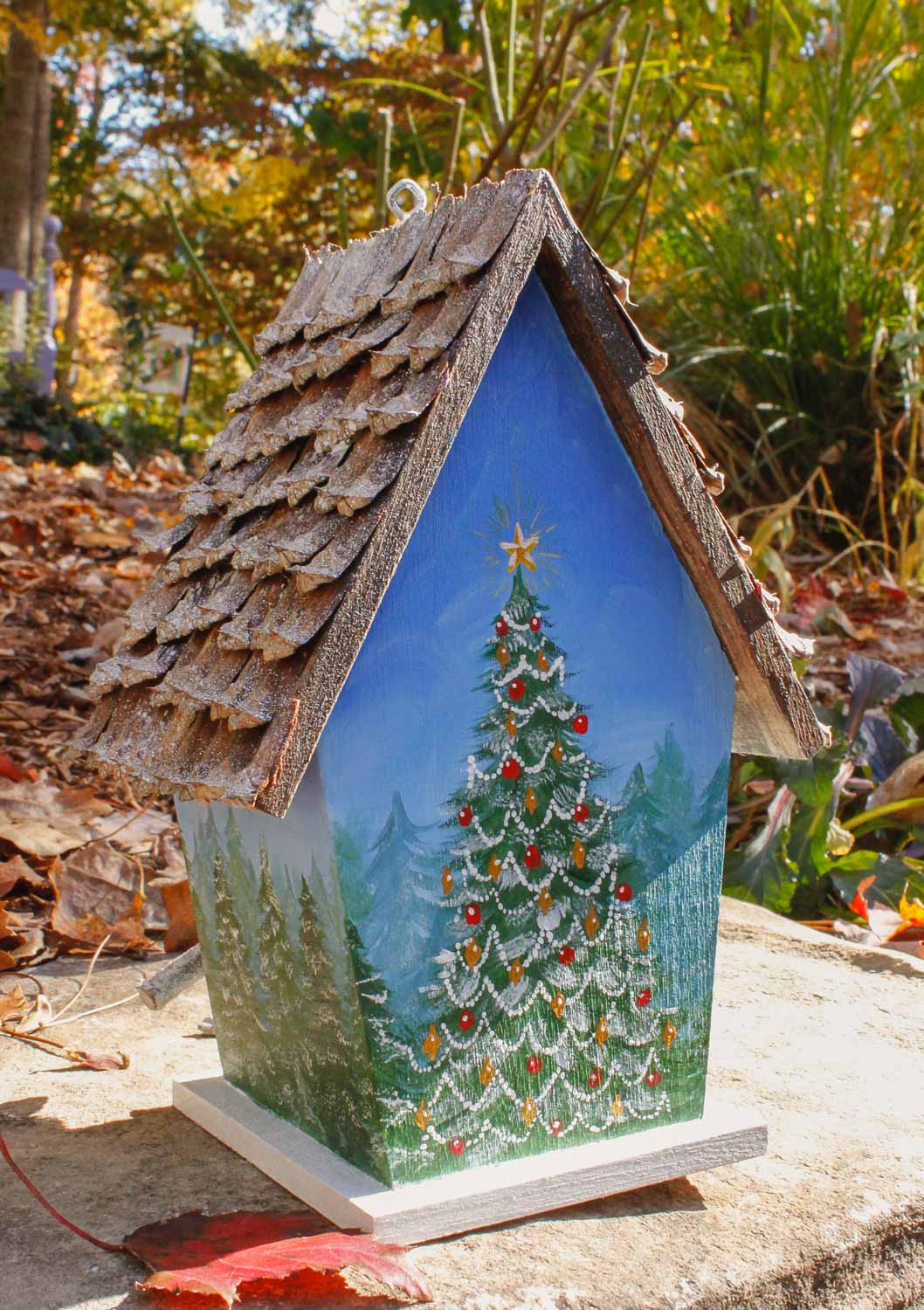birdhouse with winter tree scene hand-painted, pine cone roof