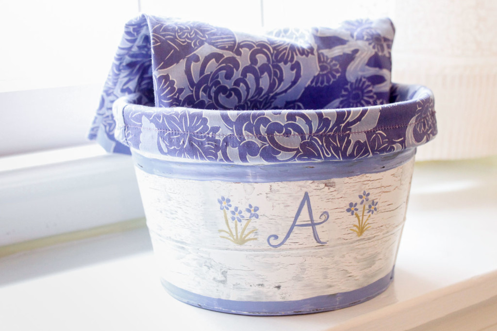 pants leng hanging out of painted pail