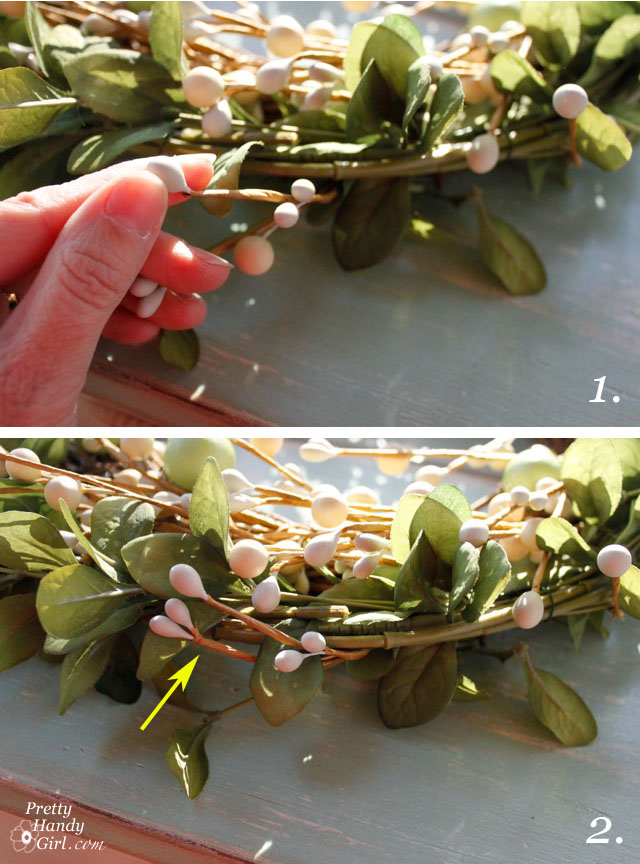 wrap berry stems around leaf wreath