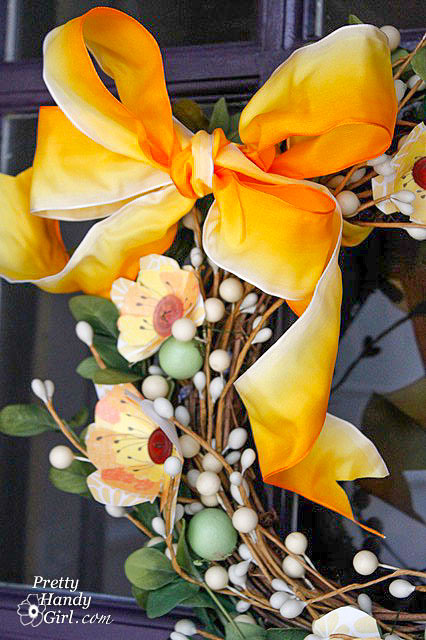 add ribbon to wreath