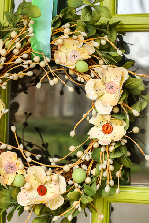 Close up scrapbook flowers and buttons