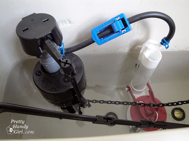 Filled_up_tank Toilet Repairs Replacing the Overflow Tube and Flapper