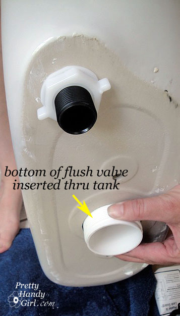 flush_valve_bottom_thru Toilet Repairs Replacing the Overflow Tube and Flapper