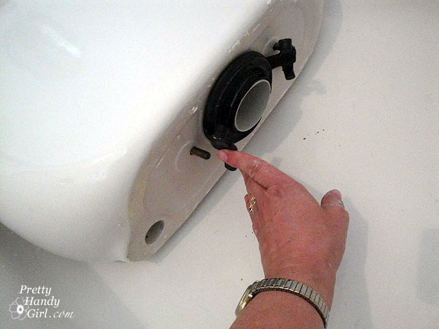 remove_old_gasket Toilet Repairs Replacing the Overflow Tube and Flapper