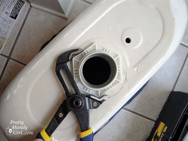 remove_old_hex_nut Toilet Repairs Replacing the Overflow Tube and Flapper