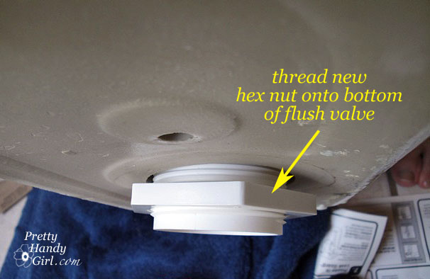 thread_hex_nut_onto_valve Toilet Repairs Replacing the Overflow Tube and Flapper