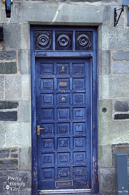 Frank Blue by Sherwin Williams - 24 panel navy blue door with antique look