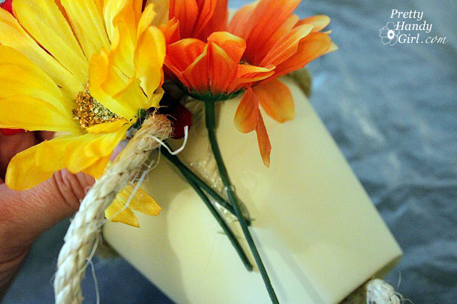 wrap_rope_over_flower_stems
