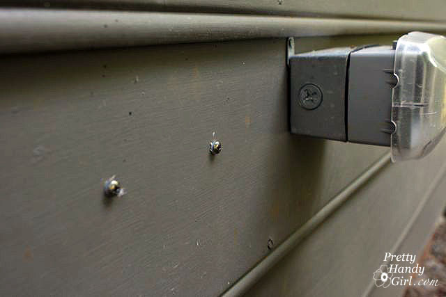 insert_screws_into_siding