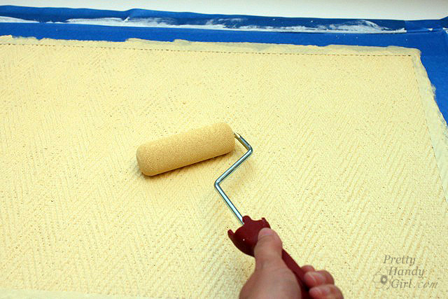 rolling_yellow_paint_on_rug