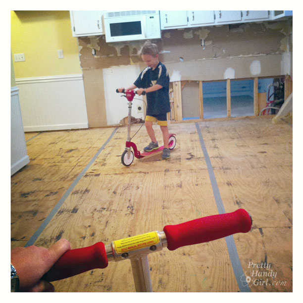 scooter_rink Kids riding scooters in a room with just plywood subfloor. Asbestos Removal - Everything You Wanted to Know and More