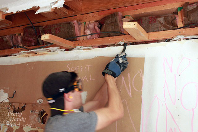 pry_remaining_2x4_off How to Remove a Soffit - Kitchen Renovation Update