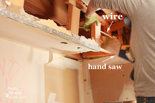 use_handsaw_around_wires How to Remove a Soffit - Kitchen Renovation Update