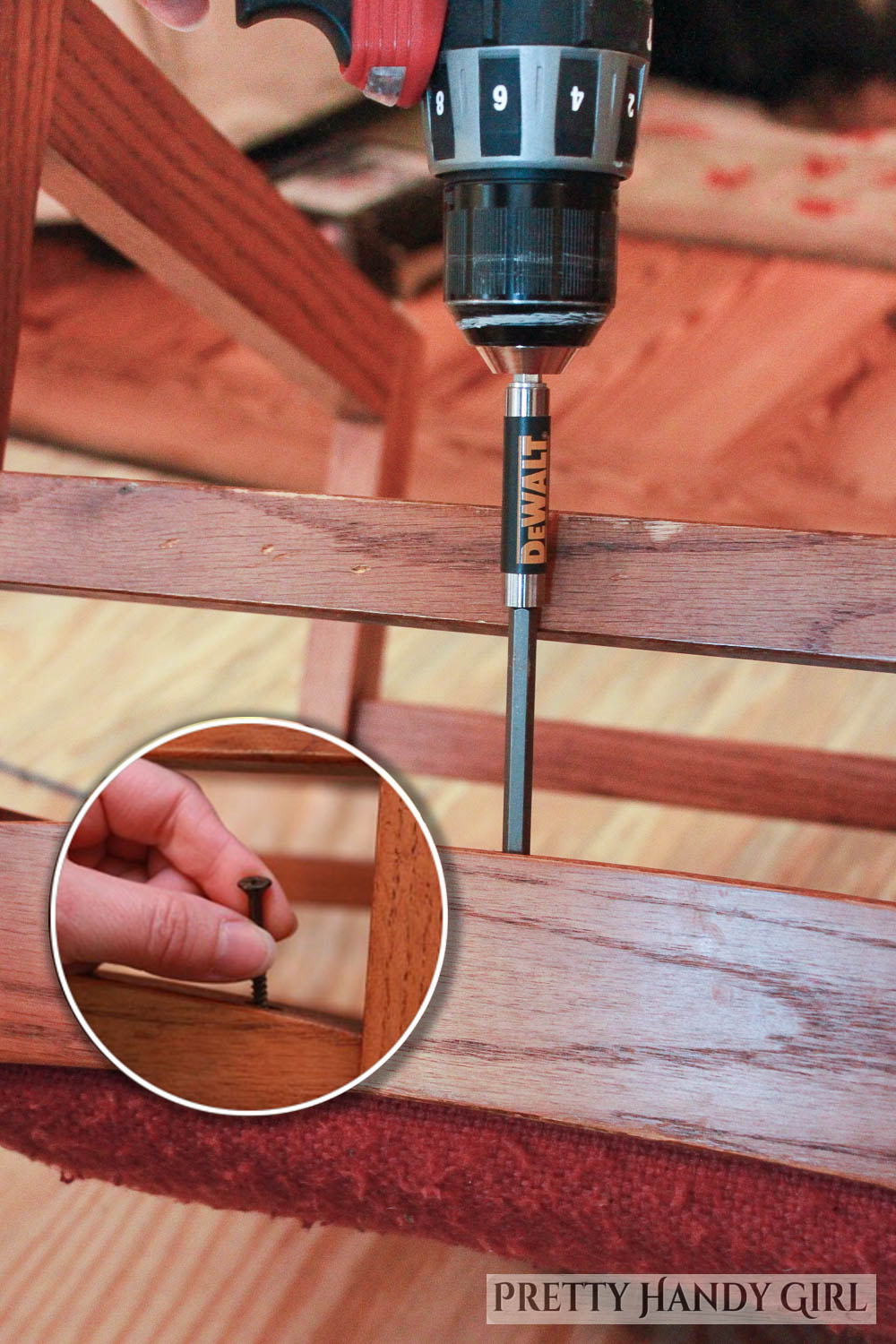upside down chair and drill removing screw from under seat cushion on a chair