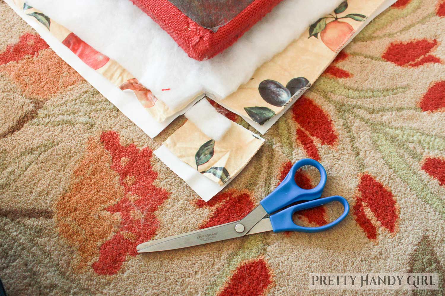 cut out corners of fabric and batting before folding