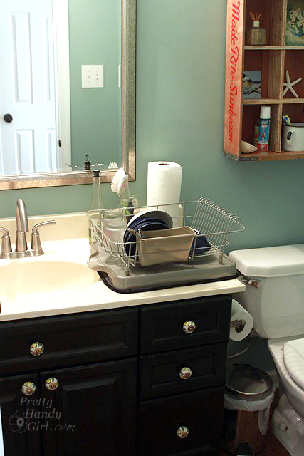 doing_dishes_in_bathroom_sink