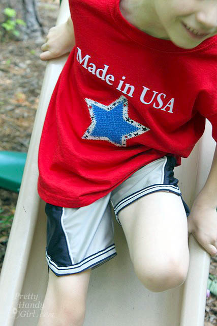 boy_on_slide_red_shirt