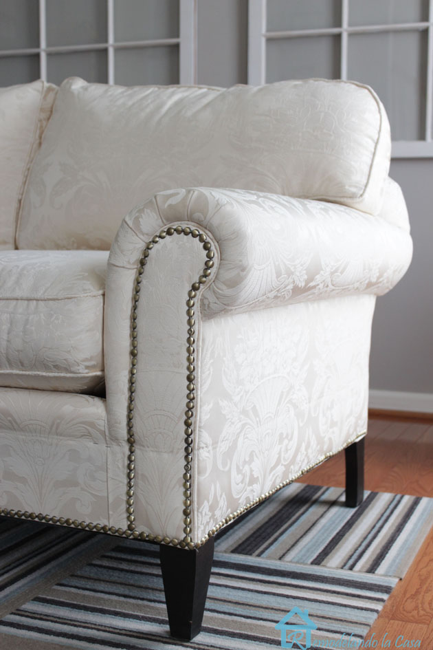 nailhead trim on arm of sofa