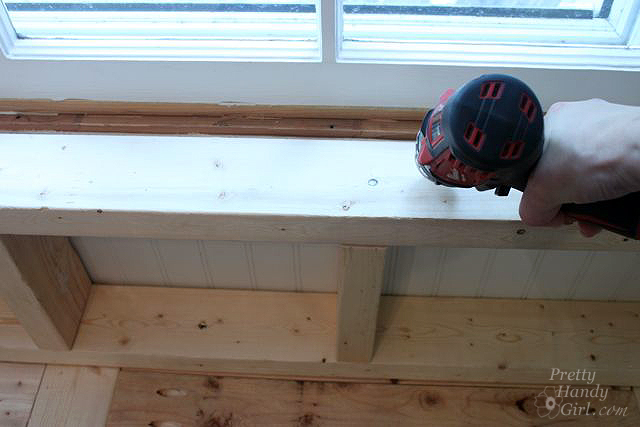secure back support to wall