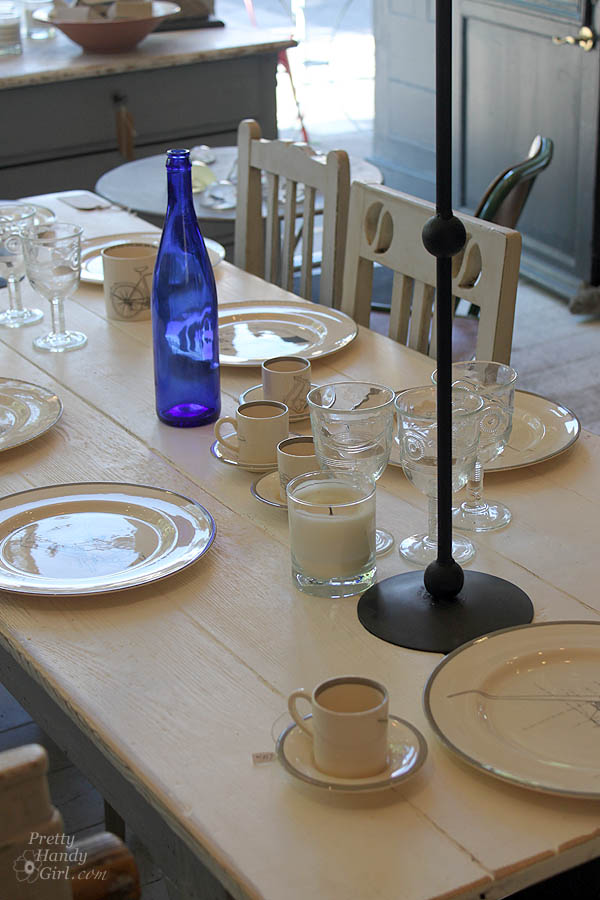 table_set_with_cobalt_bottle