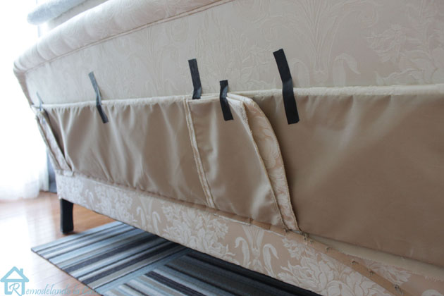 taping up sofa skirt