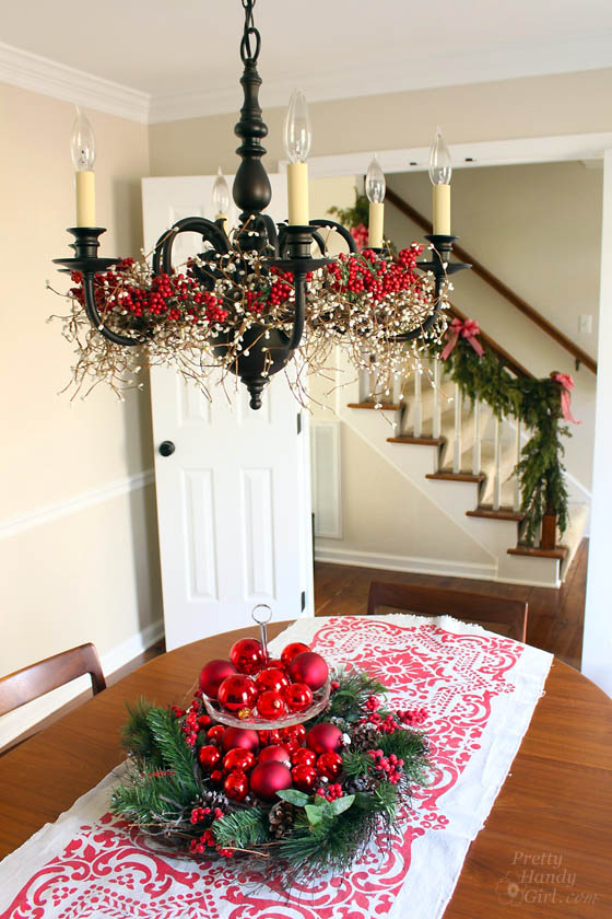 Clever holiday decor - garlands in chandelier