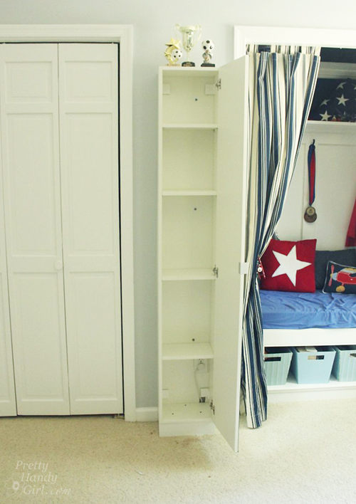 Wall-mounted IKEA LILLÅNGEN Mirrored Cabinet turned Stuffed Animal Storage | Pretty Handy Girl