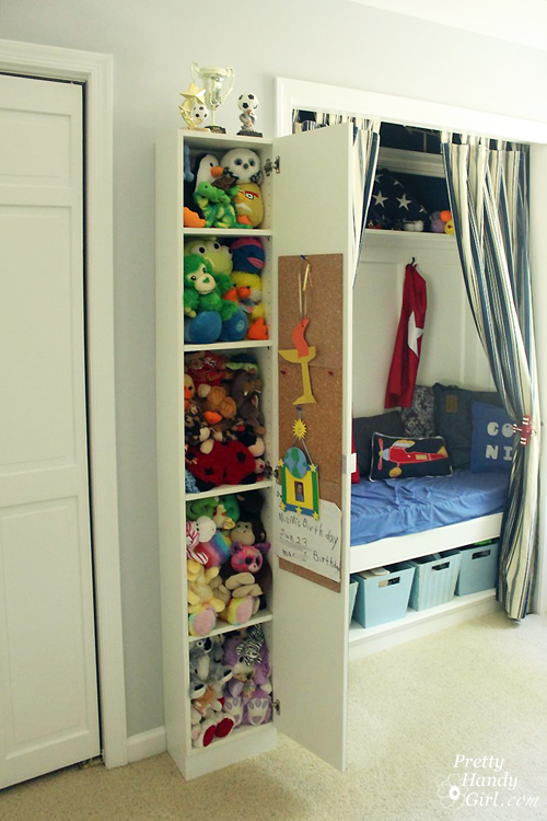 Wall-mounted IKEA LILLÅNGEN Mirrored Cabinet turned Stuffed Animal Storage | Pretty Handy Girl