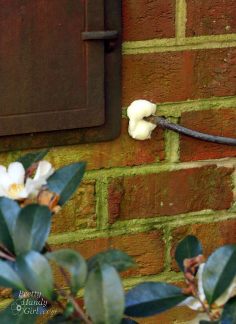 Seal Gaps Around Pipes with GREAT STUFF | Pretty Handy Girl