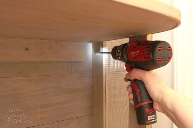 Sport Gear Storage Shelves in a Small Space | Pretty Handy Girl