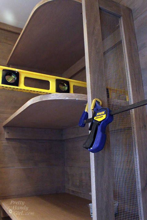 Sport Gear Storage Shelves in a Small Space | Pretty Handy Girl