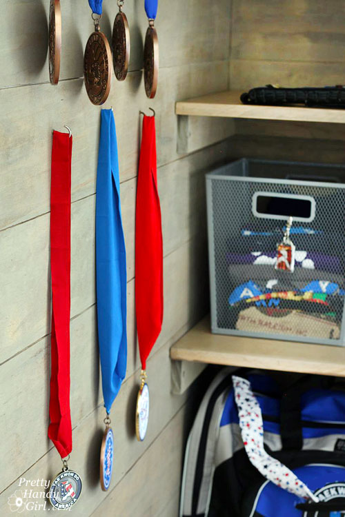 Sport Gear Storage Shelves in a Small Space | Pretty Handy Girl