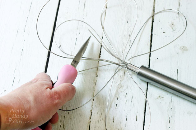 Dragonfly Garden Decor using a Dollar Store Whisk and Skewer | Pretty Handy Girl