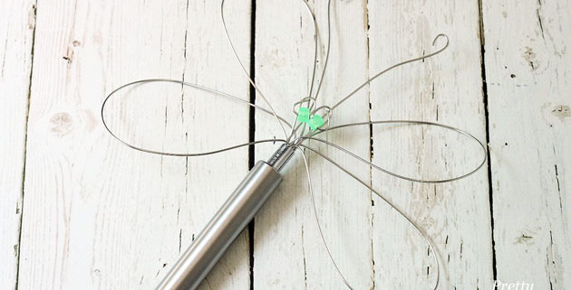 Dragonfly Garden Decor using a Dollar Store Whisk and Skewer | Pretty Handy Girl