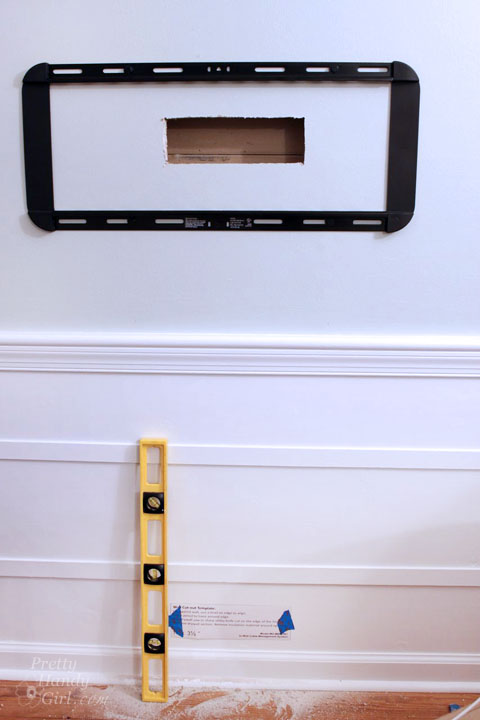 Installing a Wall Mount Flat Screen TV + Hiding Cords | PrettyHandyGirl