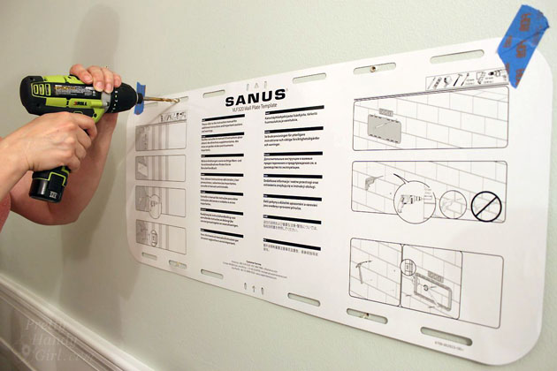 Installing a Wall Mount Flat Screen TV + Hiding Cords | PrettyHandyGirl
