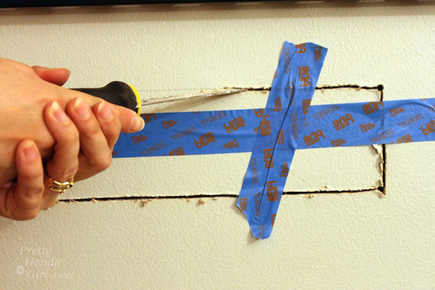 Installing a Wall Mount Flat Screen TV + Hiding Cords | PrettyHandyGirl