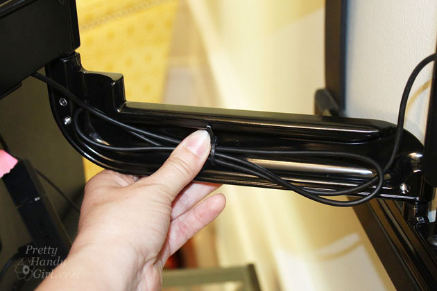 Installing a Wall Mount Flat Screen TV + Hiding Cords | PrettyHandyGirl