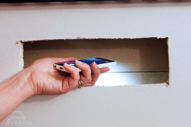 Installing a Wall Mount Flat Screen TV + Hiding Cords | PrettyHandyGirl