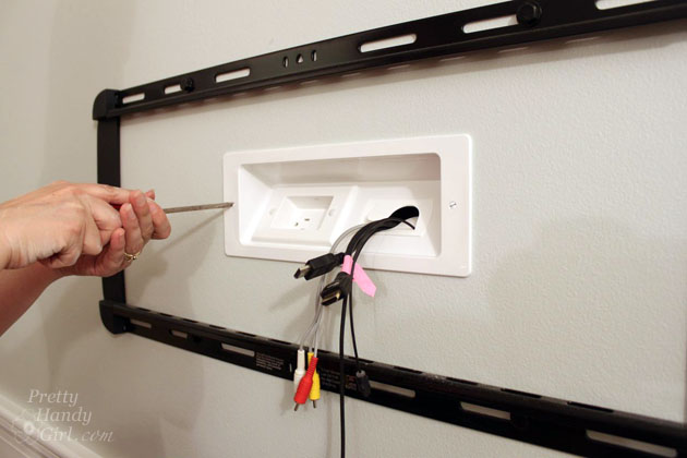 Installing a Wall Mount Flat Screen TV + Hiding Cords | PrettyHandyGirl