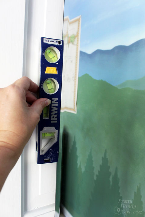 Install a ReadyMade Mirror Frame on Door | Pretty Handy Girl