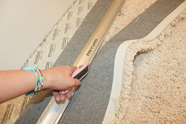 Faking Wall-to-Wall Carpet with an Area Rug | Pretty Handy Girl