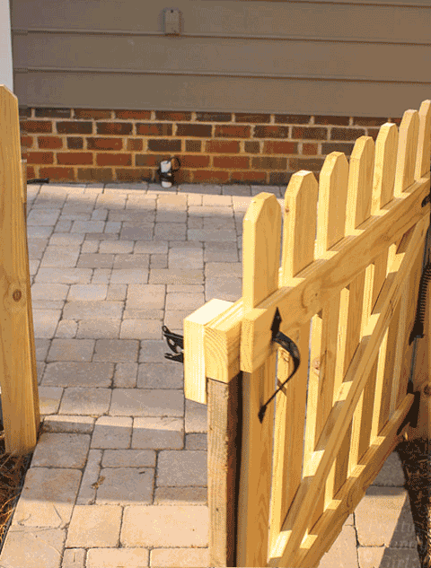 Self-closing gate spring | Pretty Handy Girl