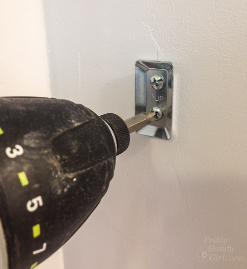 How to Install a Frameless Oval Mirror on the Wall | Pretty Handy Girl