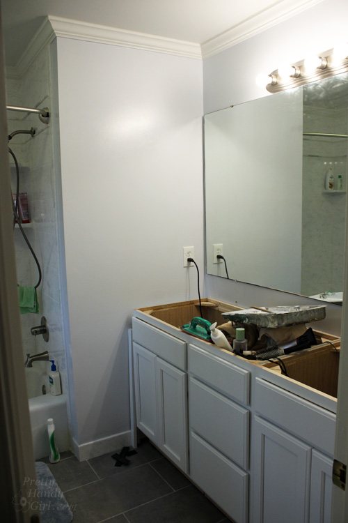 How to Hang a Frameless Oval Mirror on the Wall | Pretty Handy Girl