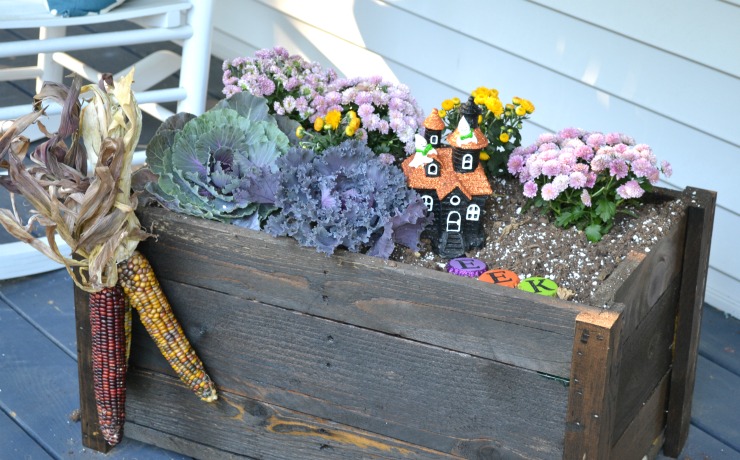 Add a fun Halloween Ghostly Garden to your fall planter. | PrettyHandyGirl.com