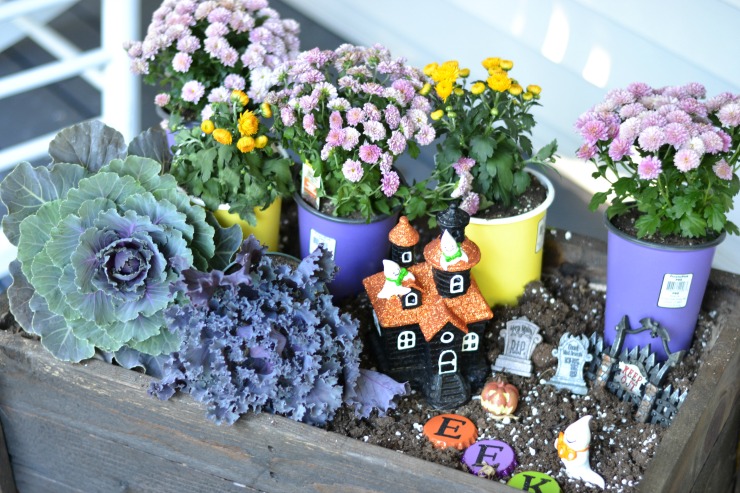 Add a fun Halloween Ghostly Garden to your fall planter. | PrettyHandyGirl.com