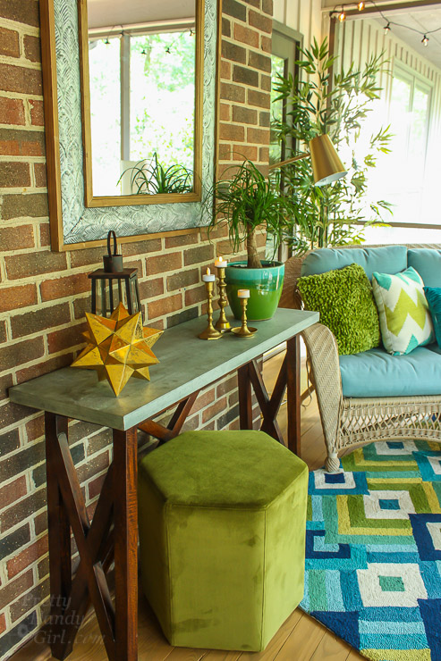 This Drab Screen Porch got a major Makeover with pops of Aqua and Green! Yummy Color!