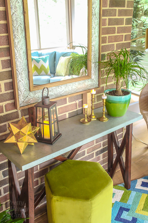 This Drab Screen Porch got a major Makeover with pops of Aqua and Green! Yummy Color!