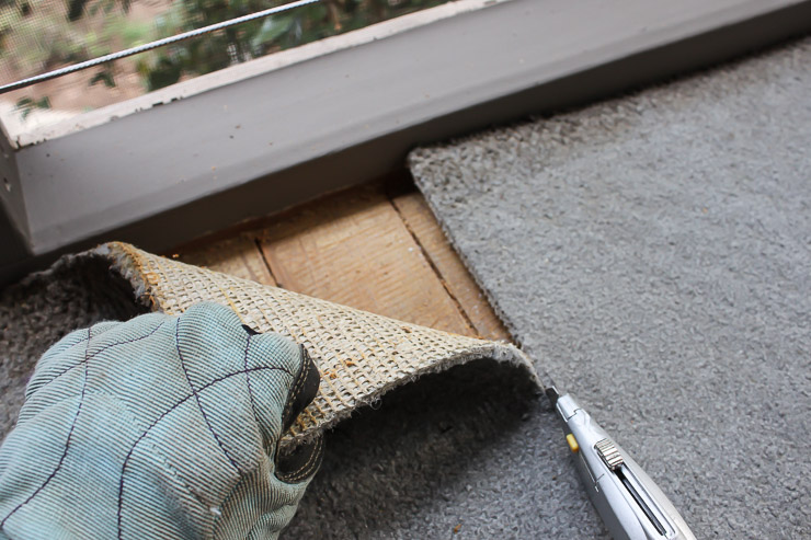 cutting-old-carpet-out-utility-knife